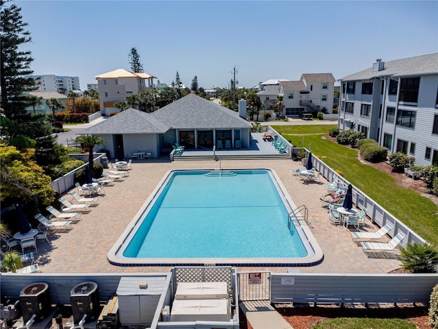 865 Ladyfish Ave Unit C104, New Smyrna Beach, FL 32169 - community pool featuring fence and a patio