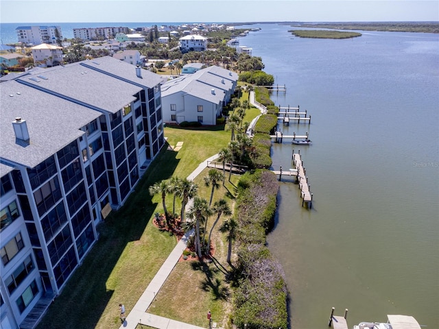 865 Ladyfish Ave Unit C104, New Smyrna Beach, FL 32169 - drone / aerial view featuring a water view