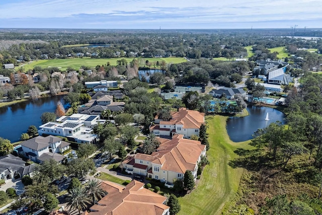 bird's eye view featuring view of golf course, a water view, and a residential view