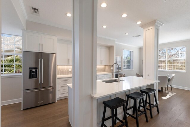8035 St Simons St Unit 8035, University Park, FL 34201 - kitchen featuring a healthy amount of sunlight, crown molding, a sink, and high quality fridge