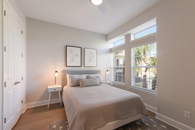 8035 St Simons St Unit 8035, University Park, FL 34201 - bedroom with wood finished floors, baseboards, and a ceiling fan