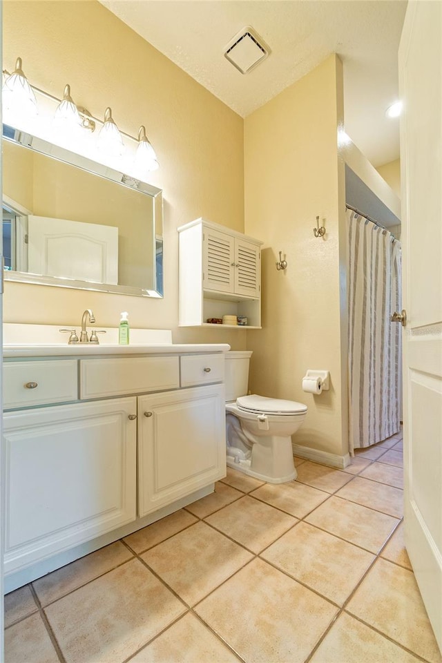3509 Battersea Ct, Belle Isle, FL 32812 - bathroom with a shower with curtain, toilet, baseboards, tile patterned flooring, and vanity