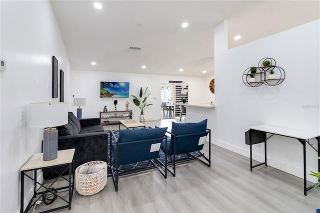 7803 Laurel Oak Ln, Kissimmee, FL 34747 - living area with recessed lighting, baseboards, wood finished floors, and visible vents