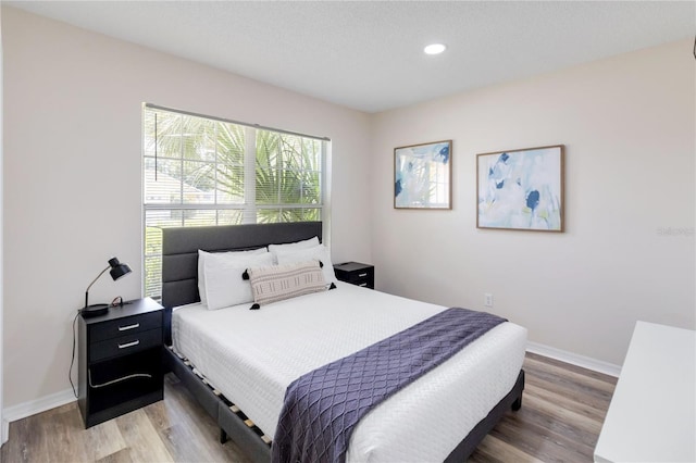 7803 Laurel Oak Ln, Kissimmee, FL 34747 - bedroom featuring baseboards, recessed lighting, and light wood finished floors