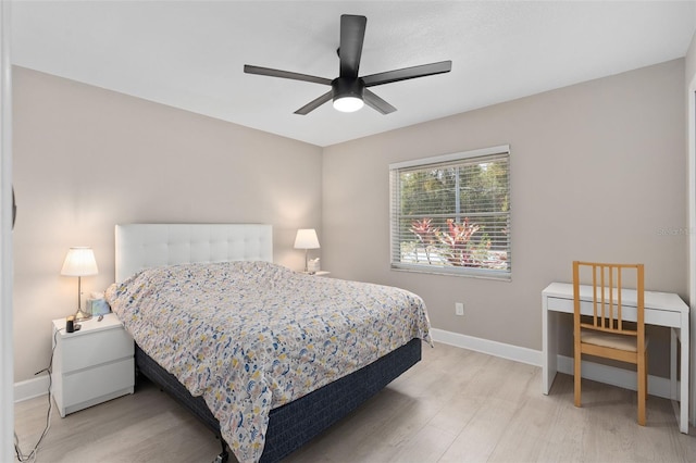 197 Flame Ave, Maitland, FL 32751 - bedroom with baseboards, a ceiling fan, and light wood-type flooring
