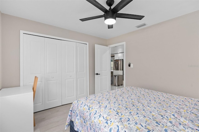 197 Flame Ave, Maitland, FL 32751 - bedroom featuring light wood-style flooring, visible vents, a closet, and a ceiling fan