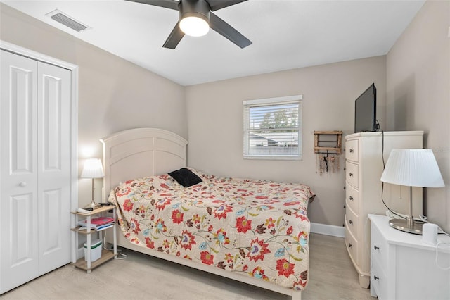 197 Flame Ave, Maitland, FL 32751 - bedroom with a closet, light wood-style floors, ceiling fan, baseboards, and visible vents