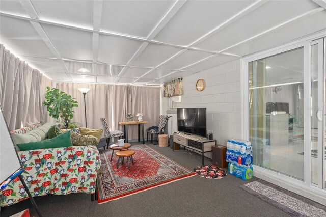 197 Flame Ave, Maitland, FL 32751 - carpeted living room featuring concrete block wall