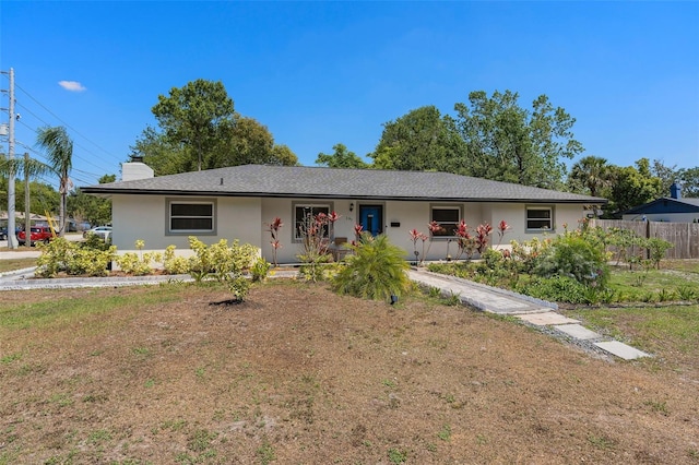 197 Flame Ave, Maitland, FL 32751 - ranch-style house featuring fence, a porch, a chimney, and stucco siding