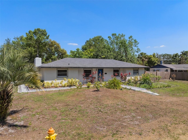 197 Flame Ave, Maitland, FL 32751 - ranch-style home with a chimney, fence, a front lawn, stucco siding, and a porch