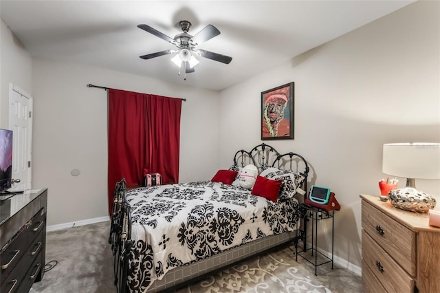 bedroom featuring baseboards, carpet, and a ceiling fan