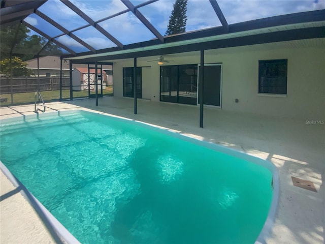 view of pool featuring a fenced in pool, a patio, glass enclosure, and fence