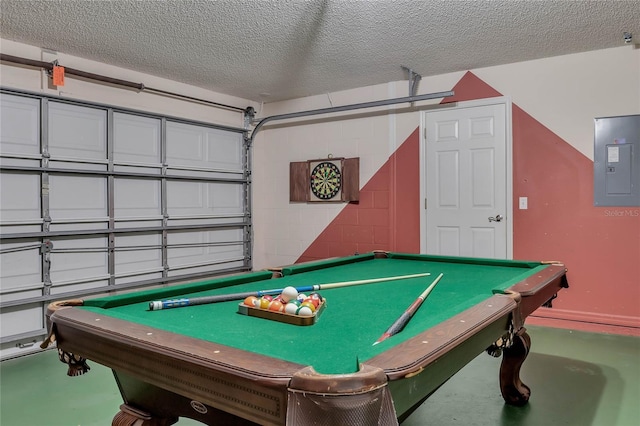 playroom featuring concrete block wall, electric panel, pool table, finished concrete floors, and a textured ceiling