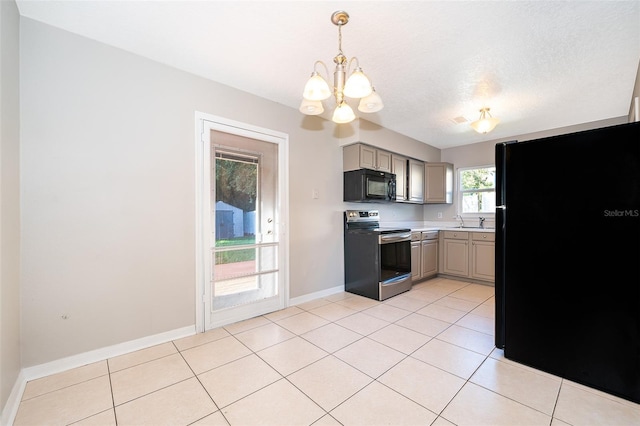 kitchen with light countertops, a notable chandelier, black appliances, and gray cabinetry