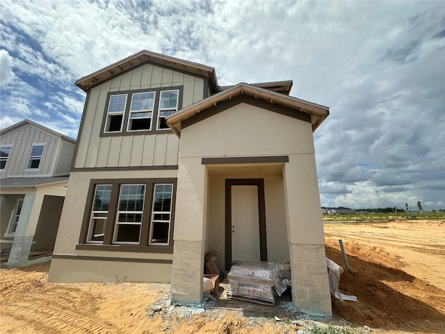 17347 Beachgrass Aly, Winter Garden, FL 34787 - view of front of house with board and batten siding and stucco siding