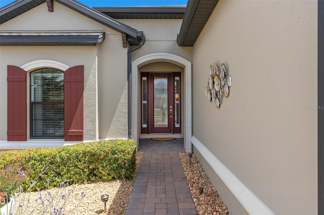 2530 Stargrass Cir, Clermont, FL 34715 - view of exterior entry with stucco siding