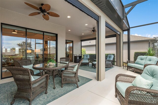 2530 Stargrass Cir, Clermont, FL 34715 - sunroom / solarium with ceiling fan and outdoor lounge area