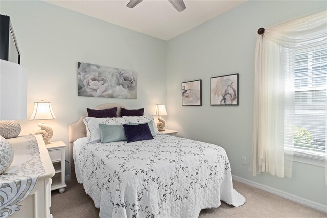 2530 Stargrass Cir, Clermont, FL 34715 - bedroom featuring carpet floors, a ceiling fan, and baseboards