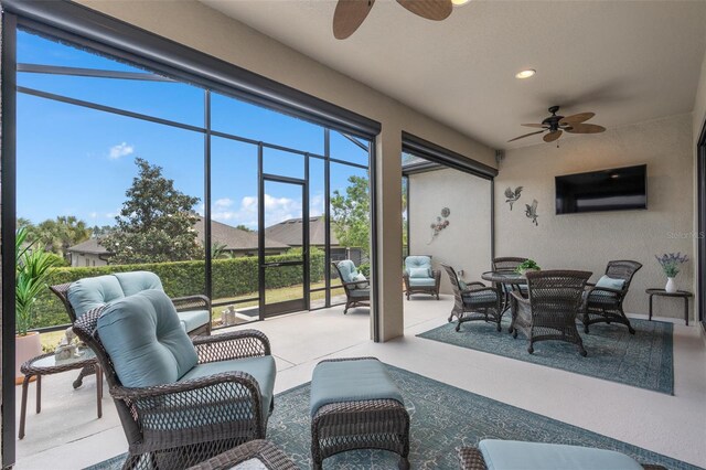 2530 Stargrass Cir, Clermont, FL 34715 - sunroom / solarium featuring outdoor lounge area and a ceiling fan