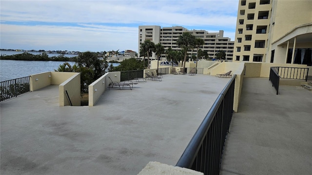 view of patio / terrace featuring a water view