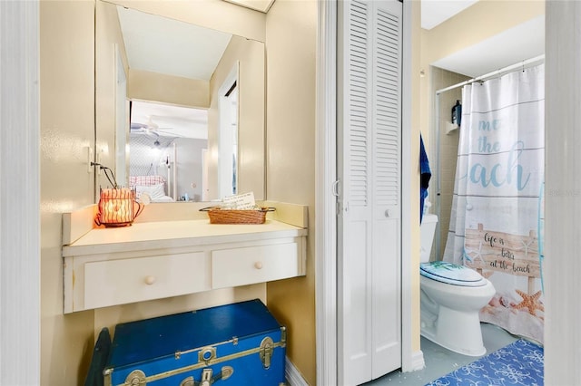 432 Taylorville St, Deltona, FL 32725 - bathroom with vanity, a closet, ceiling fan, and toilet