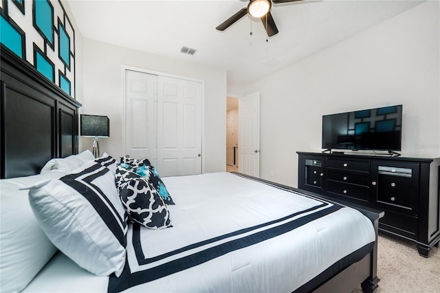 1781 Sawyer Palm Pl, Kissimmee, FL 34747 - bedroom with a closet, visible vents, a ceiling fan, and light colored carpet