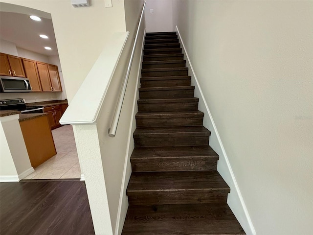 8271 Maritime Flag St Unit 125, Windermere, FL 34786 - staircase featuring wood finished floors, baseboards, and recessed lighting