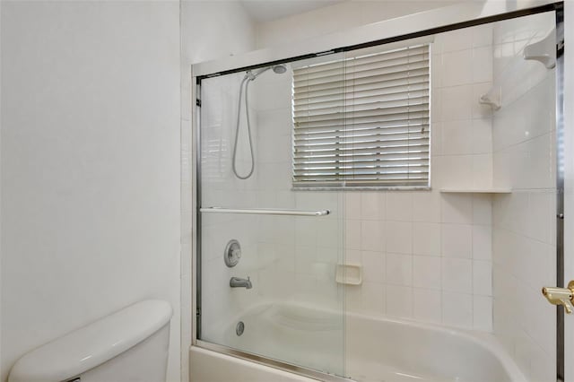 full bath with bath / shower combo with glass door and toilet