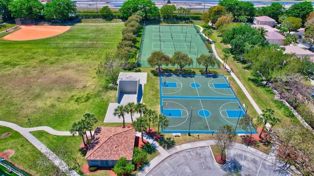view of sport court with community basketball court and a yard