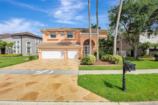 view of front of property featuring a tiled roof, stucco siding, a front lawn, a garage, and concrete driveway