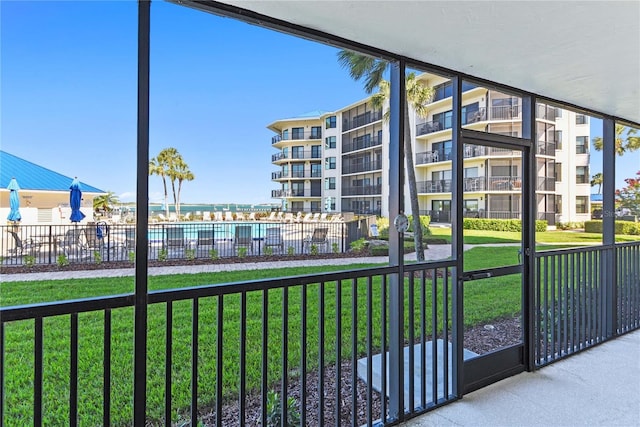 2700 N Peninsula Ave Unit 215, New Smyrna Beach, FL 32169 - view of home's community featuring fence and a lawn