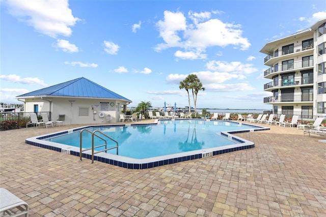 2700 N Peninsula Ave Unit 215, New Smyrna Beach, FL 32169 - pool with a patio and fence