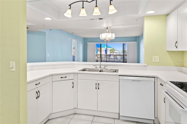 2700 N Peninsula Ave Unit 215, New Smyrna Beach, FL 32169 - kitchen with recessed lighting, visible vents, a sink, and white appliances