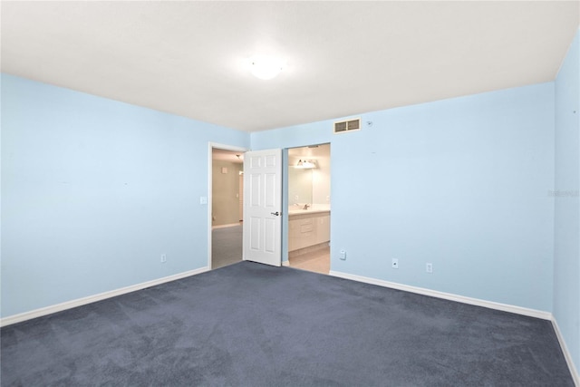 2700 N Peninsula Ave Unit 215, New Smyrna Beach, FL 32169 - carpeted spare room with baseboards and visible vents