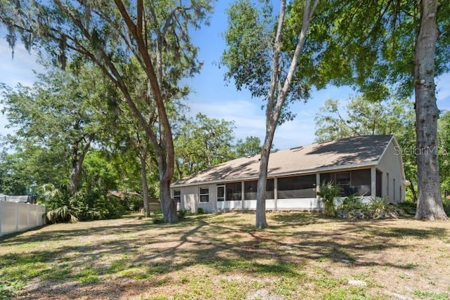 2082 Nexus Ct, Apopka, FL 32712 - back of house featuring a sunroom and fence