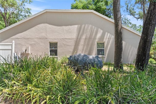 2082 Nexus Ct, Apopka, FL 32712 - view of property exterior featuring stucco siding