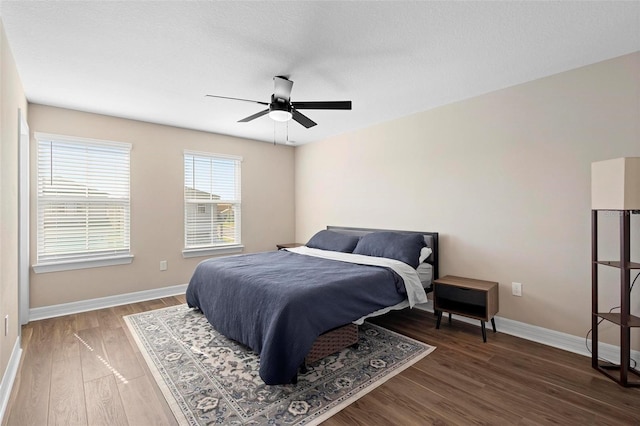 10215 Park Estates Ave, Orlando, FL 32836 - bedroom with wood finished floors, a ceiling fan, and baseboards