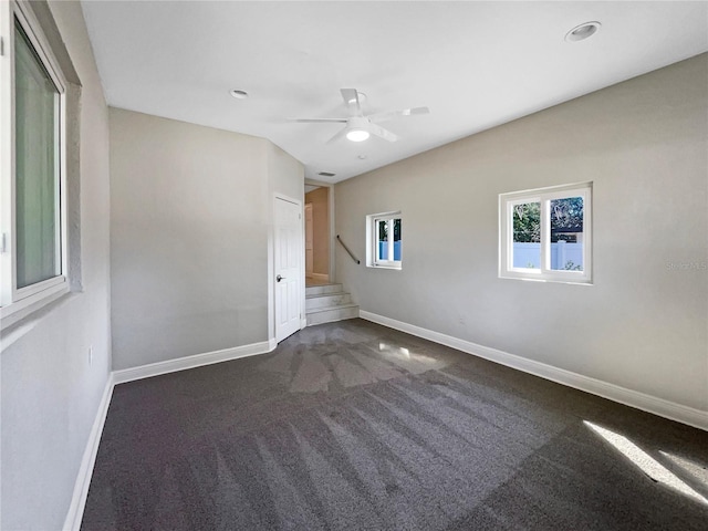 empty room featuring recessed lighting, ceiling fan, baseboards, and carpet