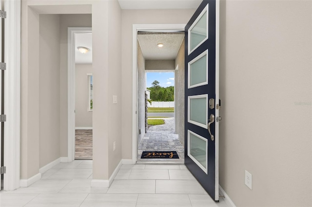 236 Pink Ibis Bnd, Saint Cloud, FL 34772 - tiled entrance foyer featuring baseboards