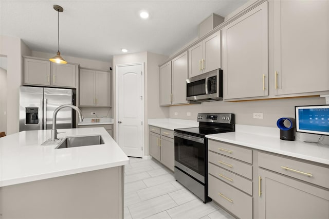 236 Pink Ibis Bnd, Saint Cloud, FL 34772 - kitchen with light countertops, gray cabinets, stainless steel appliances, and a sink