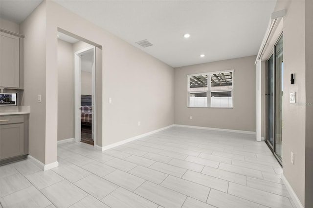 236 Pink Ibis Bnd, Saint Cloud, FL 34772 - spare room featuring baseboards, visible vents, and recessed lighting