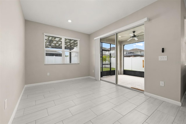 236 Pink Ibis Bnd, Saint Cloud, FL 34772 - unfurnished room featuring baseboards, a ceiling fan, and recessed lighting