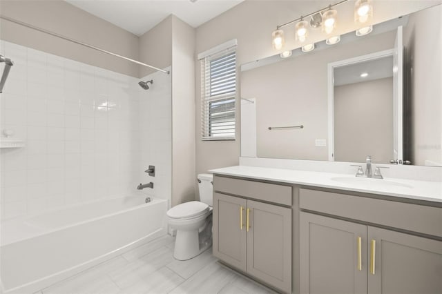 236 Pink Ibis Bnd, Saint Cloud, FL 34772 - bathroom with shower / bathing tub combination, vanity, and toilet