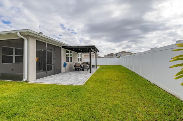 236 Pink Ibis Bnd, Saint Cloud, FL 34772 - view of yard with a sunroom, a patio, and a fenced backyard