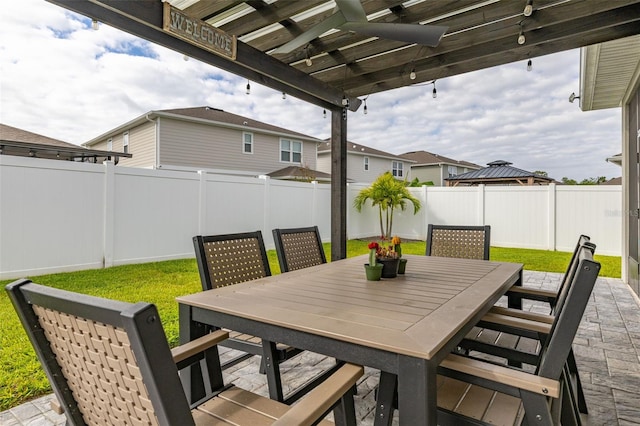 236 Pink Ibis Bnd, Saint Cloud, FL 34772 - view of patio featuring outdoor dining space and a fenced backyard