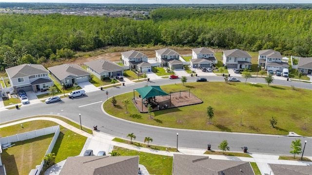 236 Pink Ibis Bnd, Saint Cloud, FL 34772 - bird's eye view featuring a forest view and a residential view