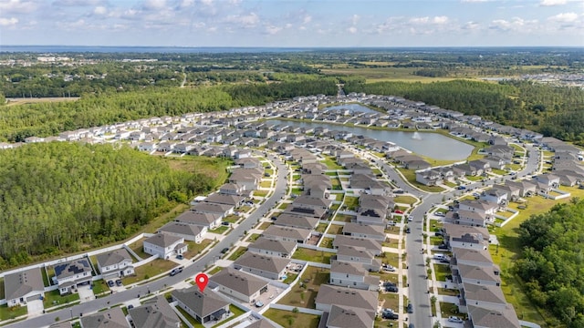 236 Pink Ibis Bnd, Saint Cloud, FL 34772 - drone / aerial view with a forest view and a residential view