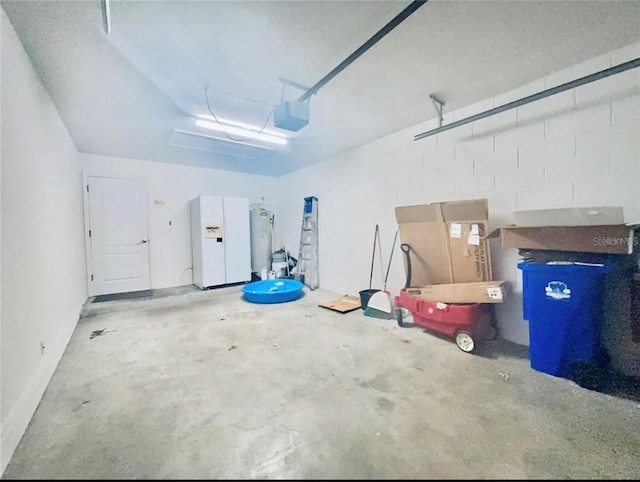 garage with white refrigerator with ice dispenser and a garage door opener