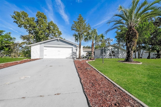 10237 Bannock St, Spring Hill, FL 34608 - single story home with driveway, a front yard, and a garage