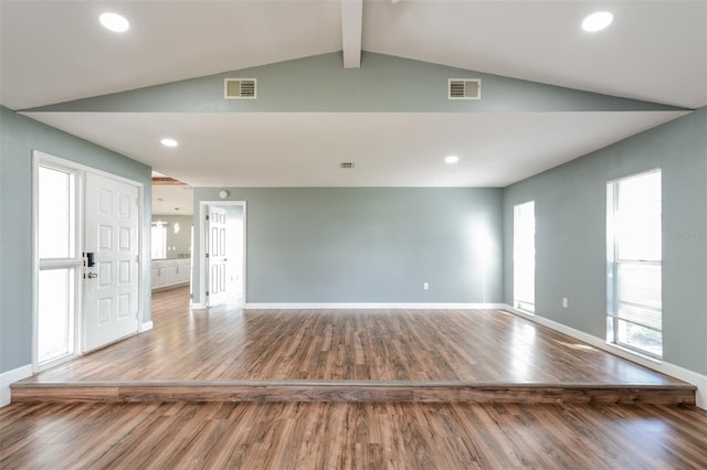 10237 Bannock St, Spring Hill, FL 34608 - unfurnished living room with lofted ceiling with beams, wood finished floors, visible vents, and recessed lighting